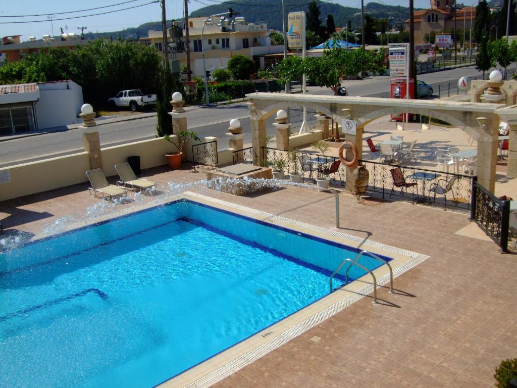 The swimming pool at or close to Antonios Hotel