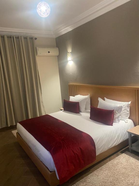 Postel nebo postele na pokoji v ubytování Golden Beach Appart'hotel