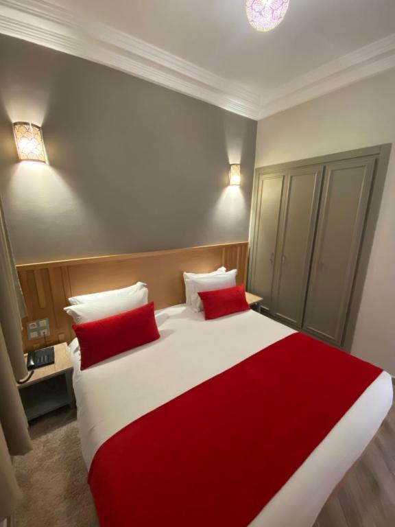 Postel nebo postele na pokoji v ubytování Golden Beach Appart'hotel