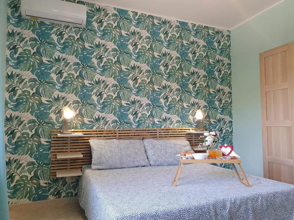 A bed or beds in a room at Home 123