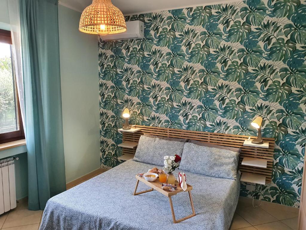 A bed or beds in a room at Home 123