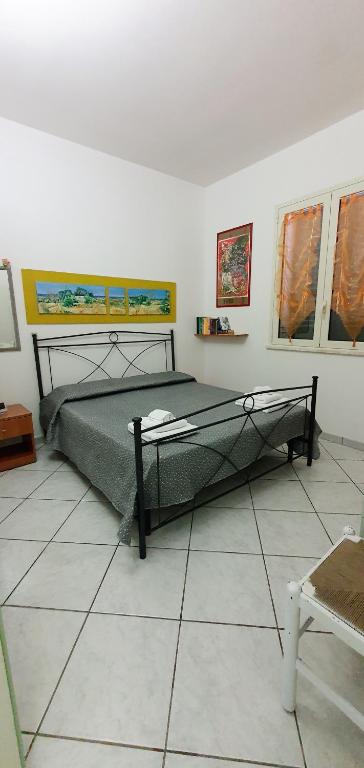 Postel nebo postele na pokoji v ubytování CASA ARTE