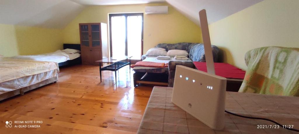 Postel nebo postele na pokoji v ubytování Dedinje