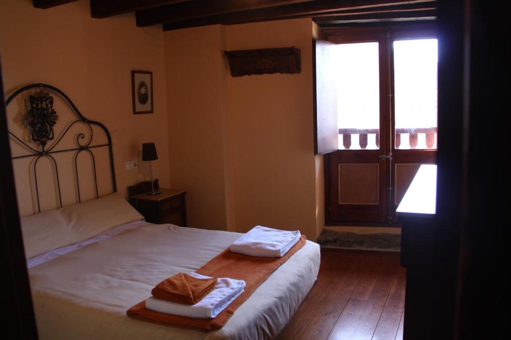 Cama o camas de una habitación en Can Bonada