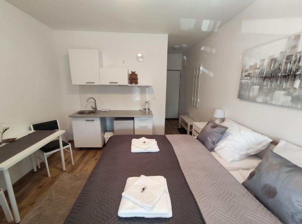 Postel nebo postele na pokoji v ubytování Penzion Wellness Chechluvka