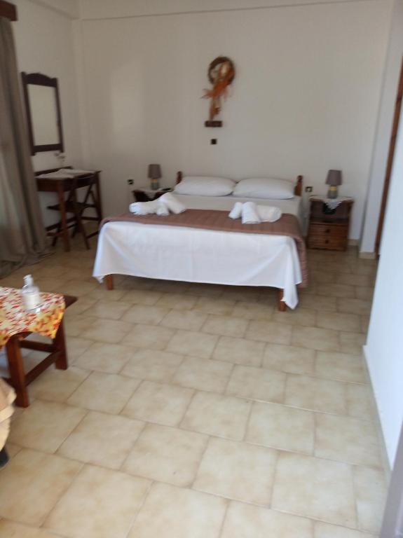 Ein Bett oder Betten in einem Zimmer der Unterkunft Buganvilla Sea View apts