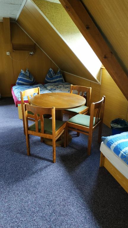 Postel nebo postele na pokoji v ubytování Penzion Kobr