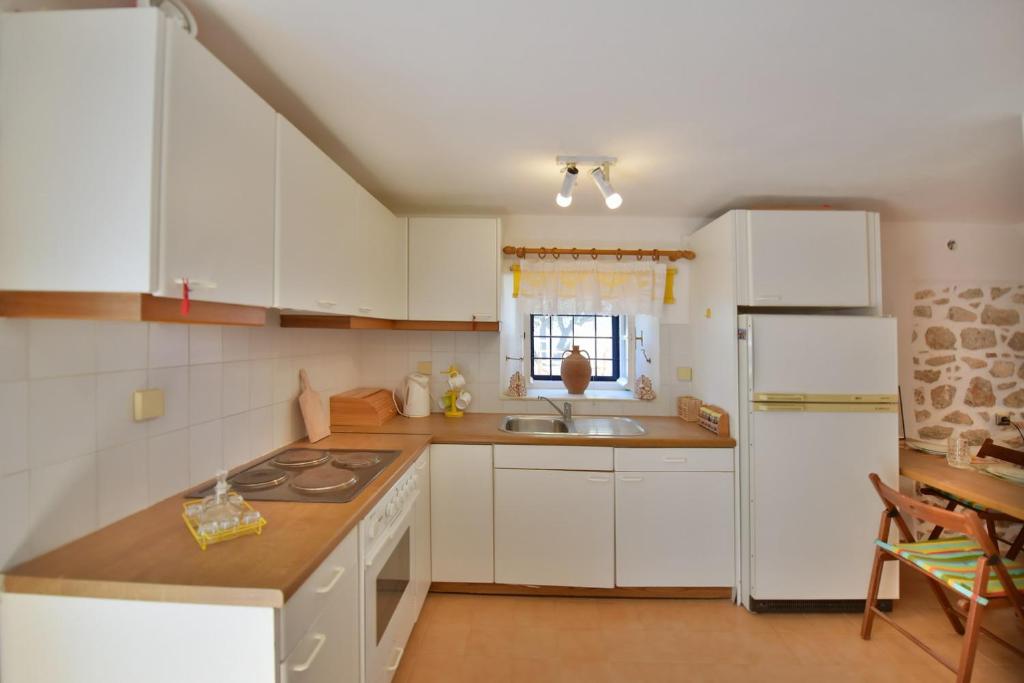 Kuchyň nebo kuchyňský kout v ubytování Options House