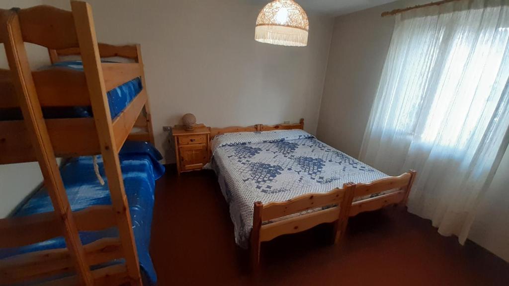 Postel nebo postele na pokoji v ubytování Appartamento Paolo