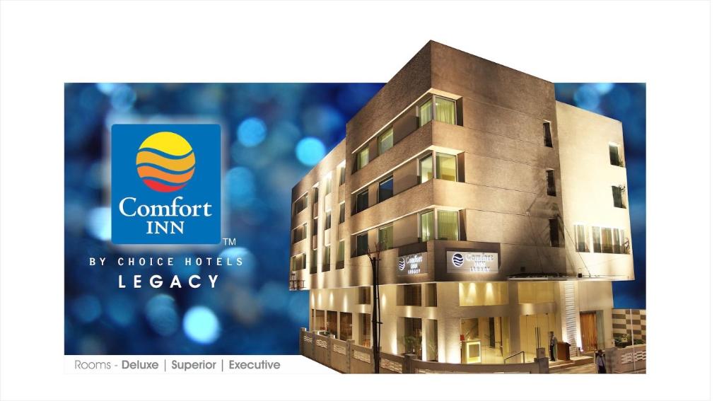 a picture of a building with the com comfort inn logo at Comfort Inn Legacy in Rajkot