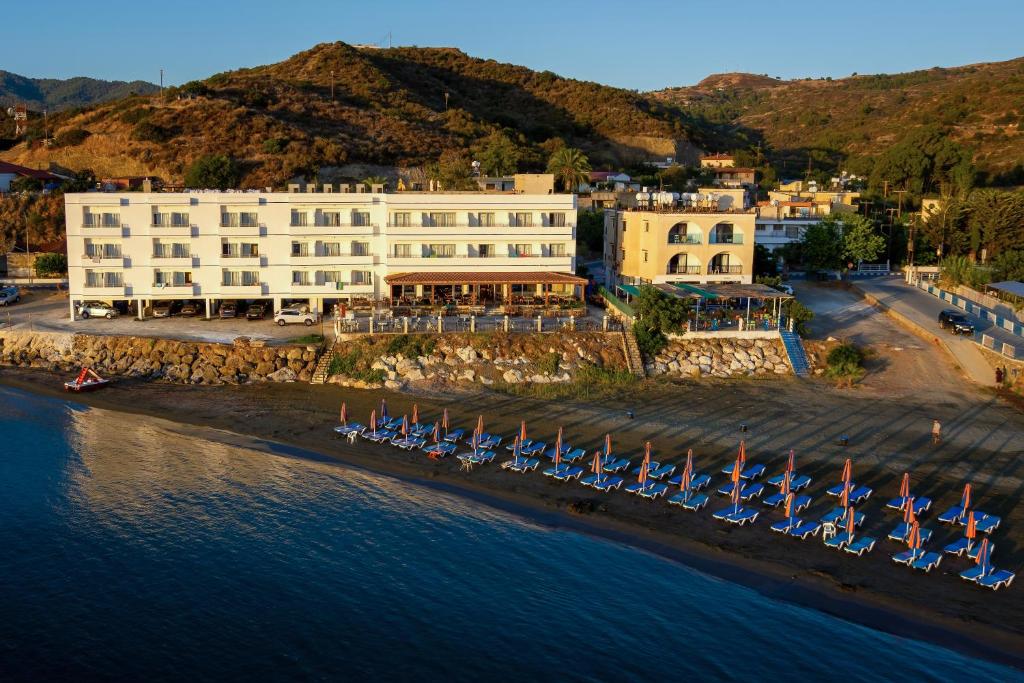 an aerial view of a hotel on the beach at Tylos Beach Hotel in Kato Pyrgos
