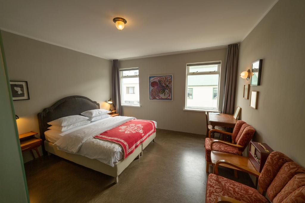 Postel nebo postele na pokoji v ubytování Hotel Siglunes