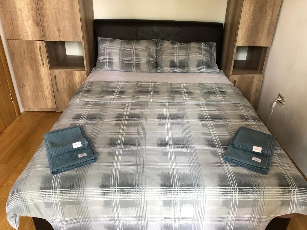 Postel nebo postele na pokoji v ubytování Apartman LUX STELLA