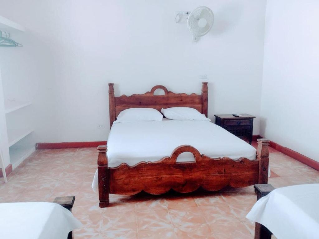 Postel nebo postele na pokoji v ubytování Hotel Refugio Bike