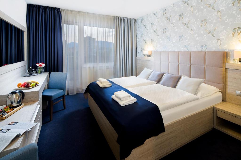 Katil atau katil-katil dalam bilik di Hotel Park