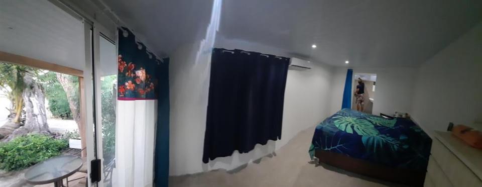 Postel nebo postele na pokoji v ubytování Matira house