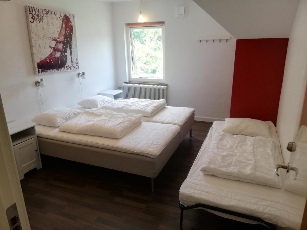 Postel nebo postele na pokoji v ubytování Hallandsåsen Hostel