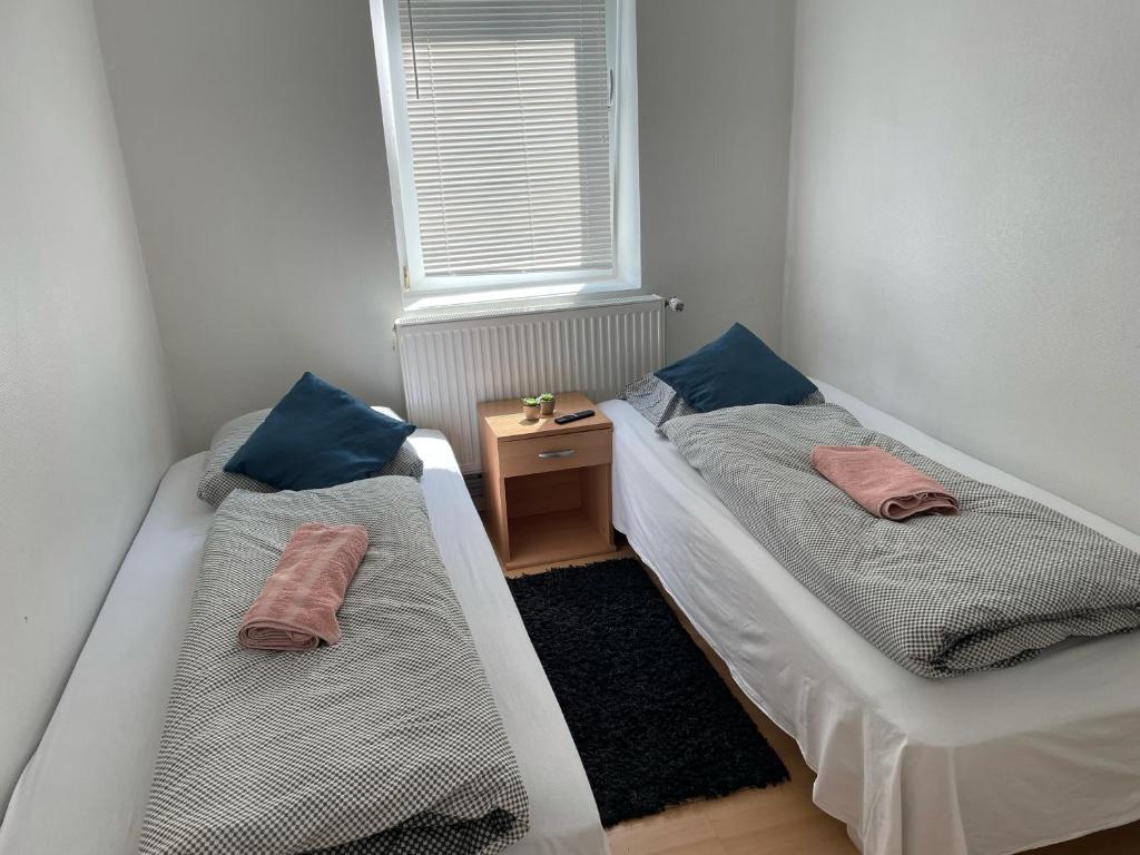 Postel nebo postele na pokoji v ubytování Padborg Hotel