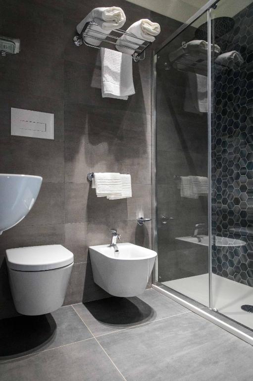 Koupelna v ubytování 4essences Boutique Rooms