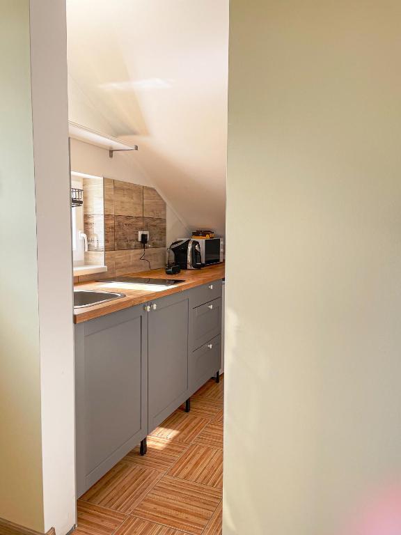 Kuchyňa alebo kuchynka v ubytovaní Pine&Chill2 Apartments