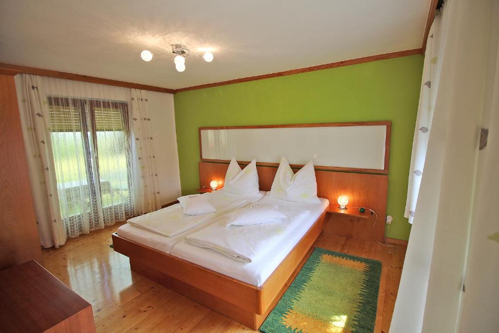 Postel nebo postele na pokoji v ubytování Haus Falle