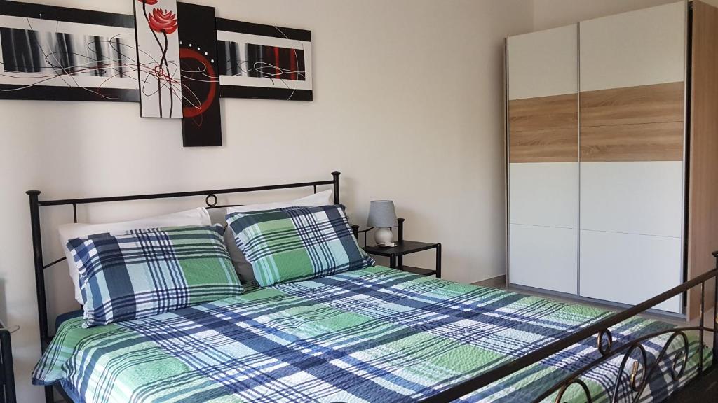 Posteľ alebo postele v izbe v ubytovaní Apartmani Jolly Poreč: blizu centra i mora