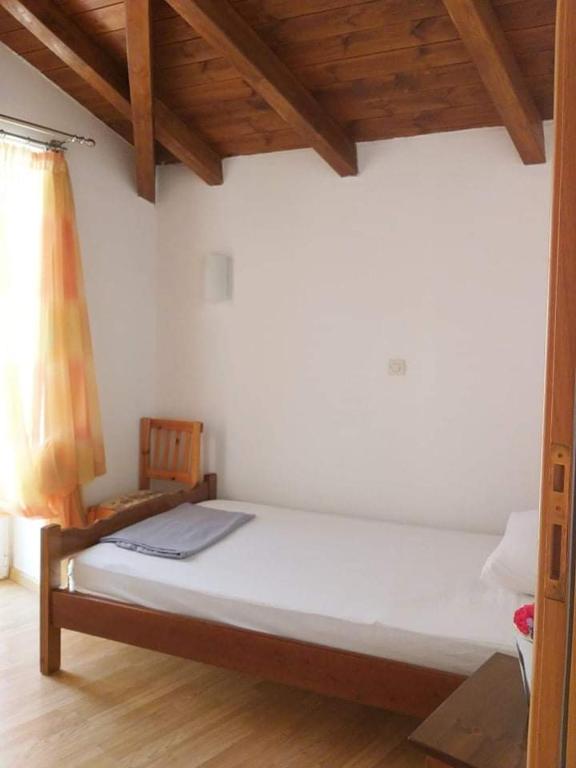 Postel nebo postele na pokoji v ubytování Delphi skyview