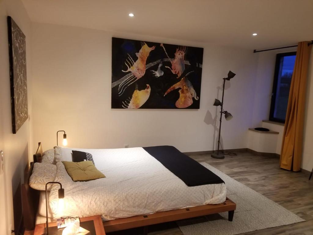 Postel nebo postele na pokoji v ubytování CHAMBRES D'HOTES MANDACHAINA