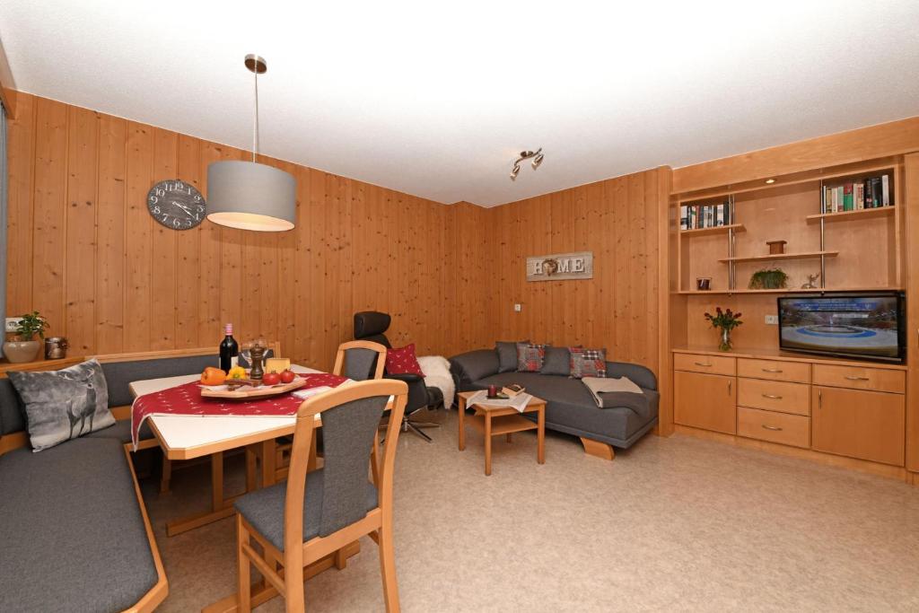 TV a/nebo společenská místnost v ubytování Rüf Wohlfühl-Apartments