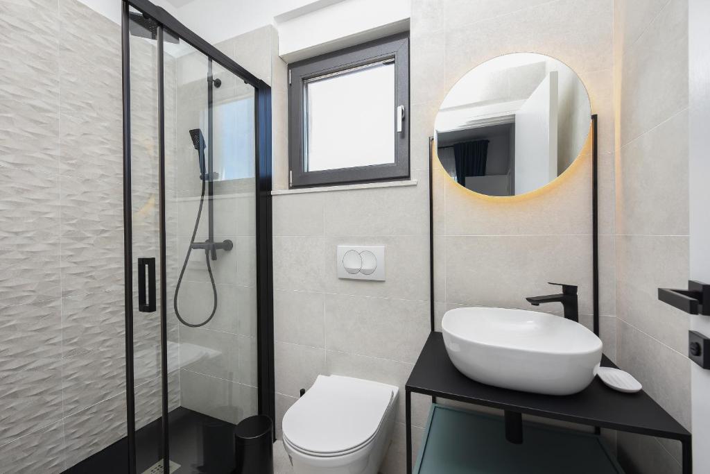 Kúpeľňa v ubytovaní Villa Pjaula