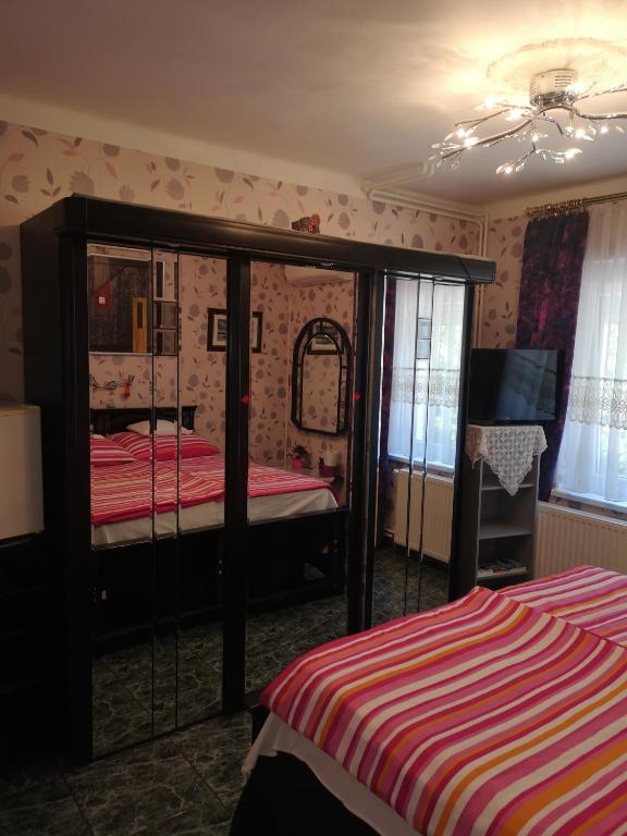 Posteľ alebo postele v izbe v ubytovaní Lake Balaton Apartmanház