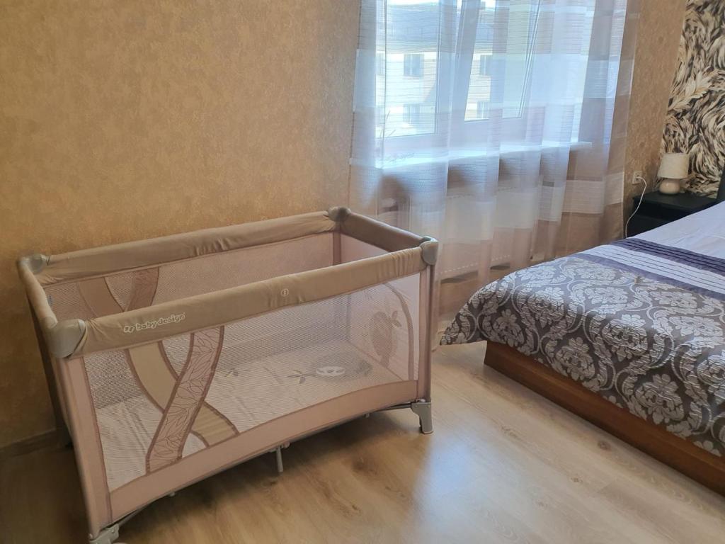 Ein Bett oder Betten in einem Zimmer der Unterkunft ashlife_home