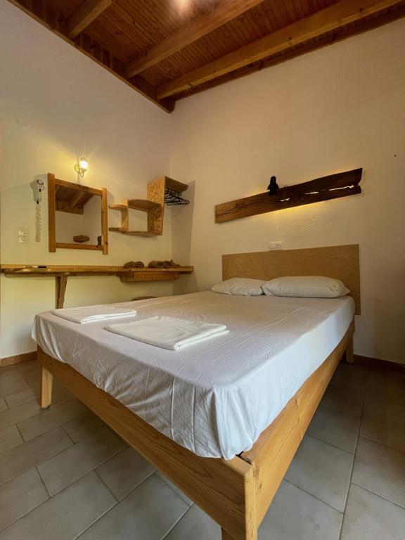 Postel nebo postele na pokoji v ubytování Pension Oasis