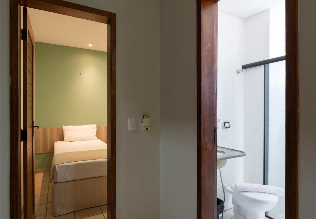Um banheiro em Hotel Vila Leste