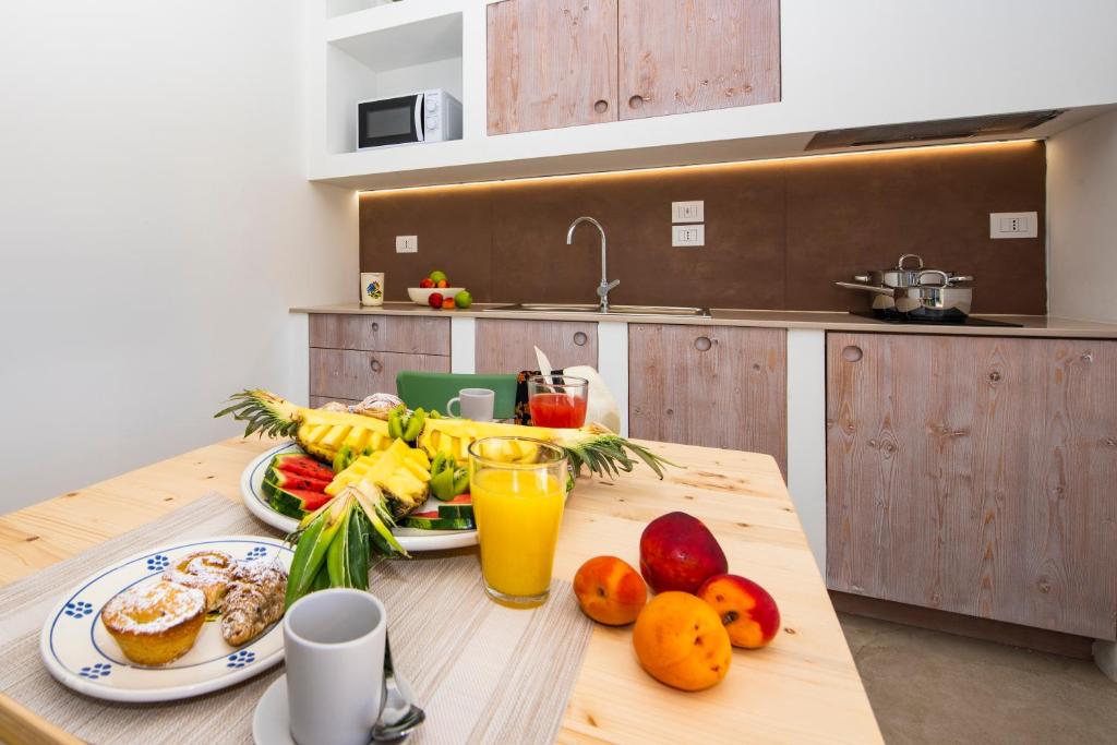 Kuchyň nebo kuchyňský kout v ubytování Livantea Agriresort e Residence