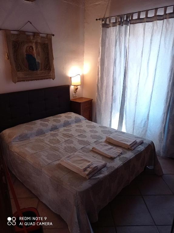 Postel nebo postele na pokoji v ubytování HOTEL TREVI Palazzo Natalini