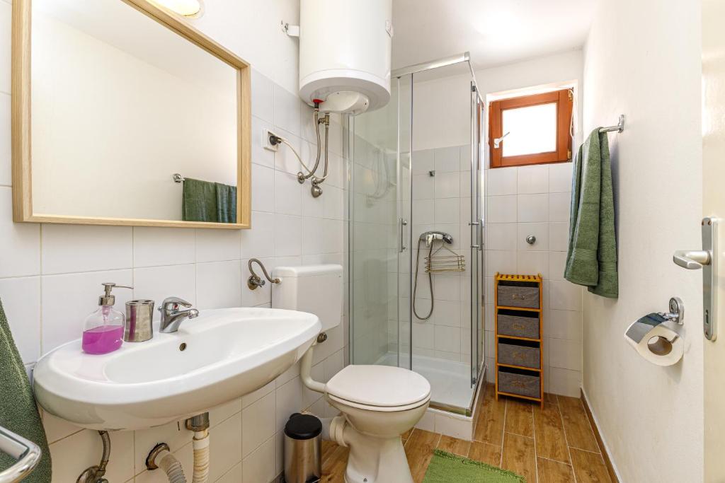 Koupelna v ubytování Al Mare Apartments