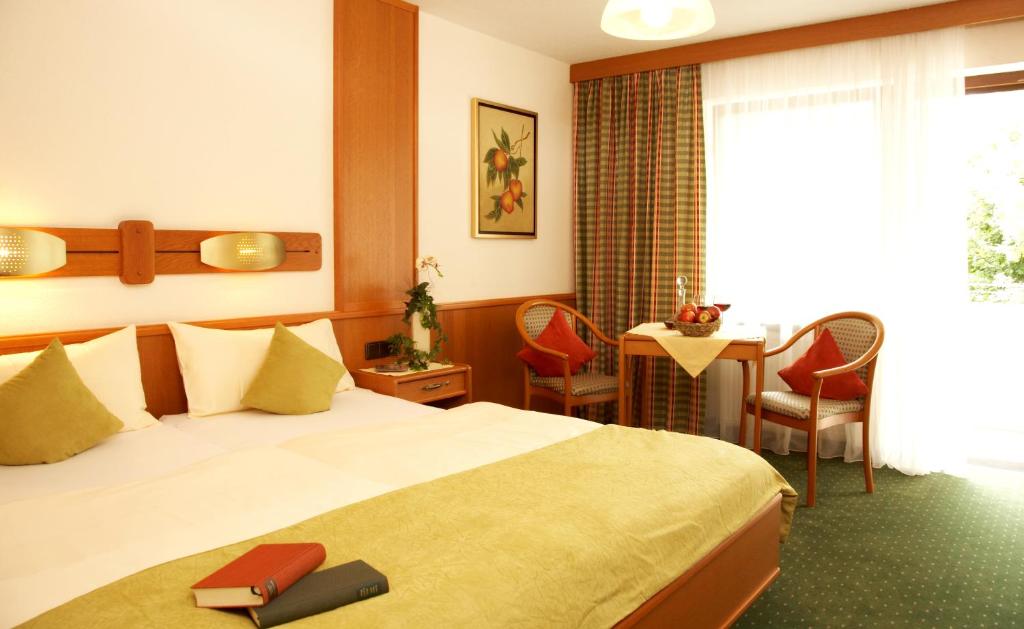 Postel nebo postele na pokoji v ubytování Apart-Hotel Pension Roßmayer