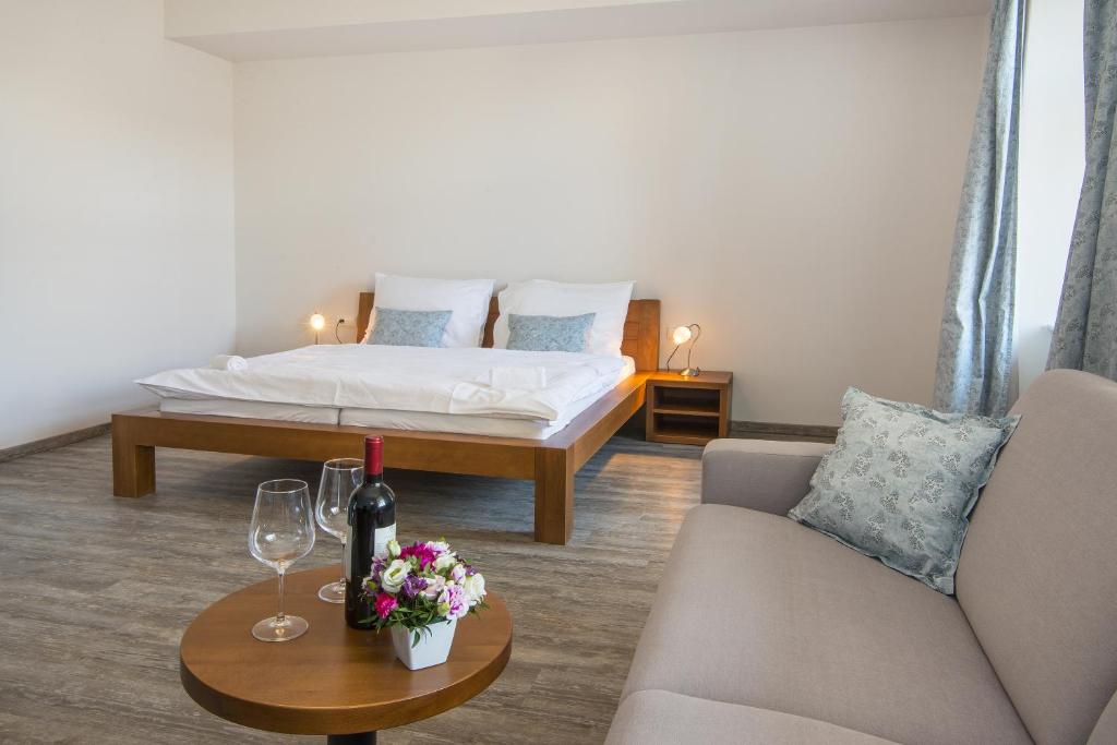 Postel nebo postele na pokoji v ubytování Hotel Anno