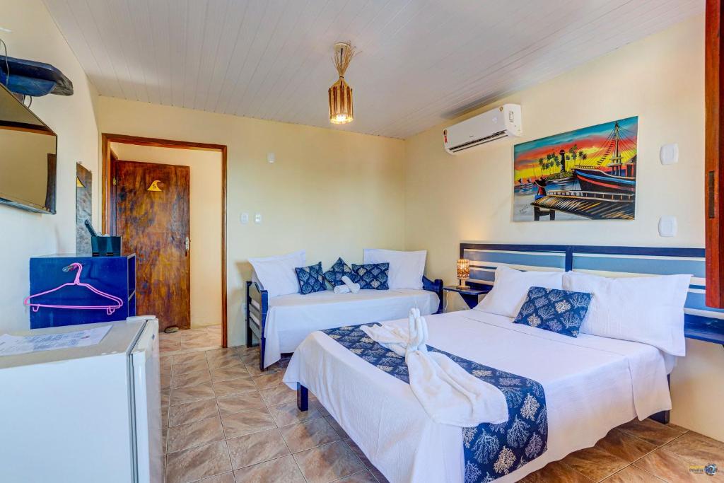 Cama ou camas em um quarto em Pousada Galeão Itacaré