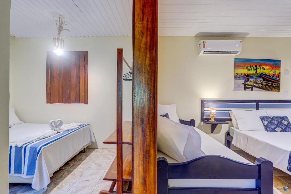 Cama ou camas em um quarto em Pousada Galeão Itacaré