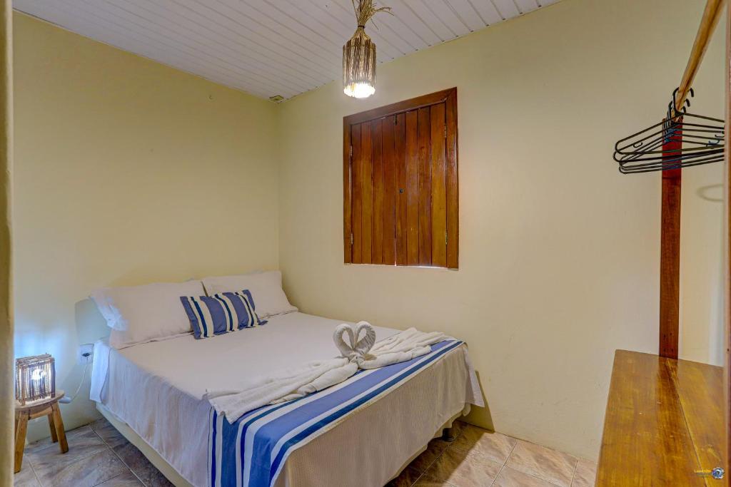 Cama ou camas em um quarto em Pousada Galeão Itacaré