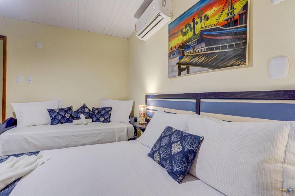 Cama ou camas em um quarto em Pousada Galeão Itacaré