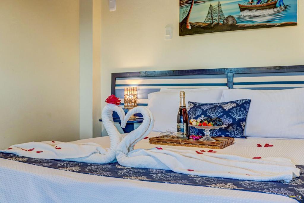 Cama ou camas em um quarto em Pousada Galeão Itacaré