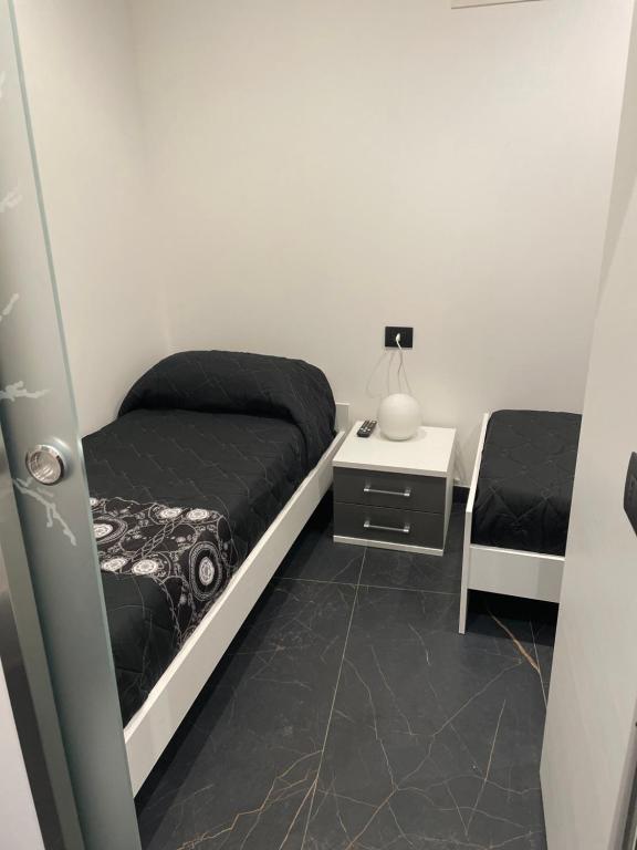 Posteľ alebo postele v izbe v ubytovaní Case vacanze donna Ina
