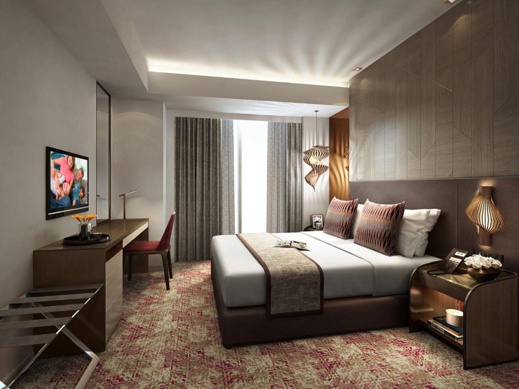 Voodi või voodid majutusasutuse Somerset Central Salcedo Makati toas