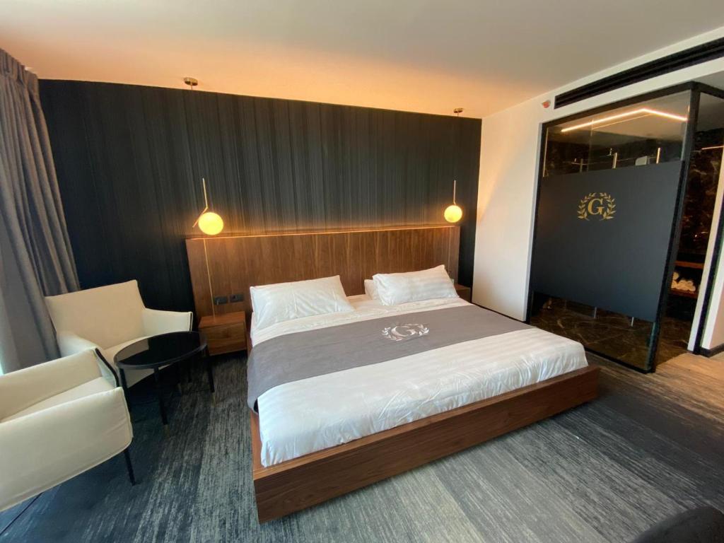 Postel nebo postele na pokoji v ubytování Golan Hotel