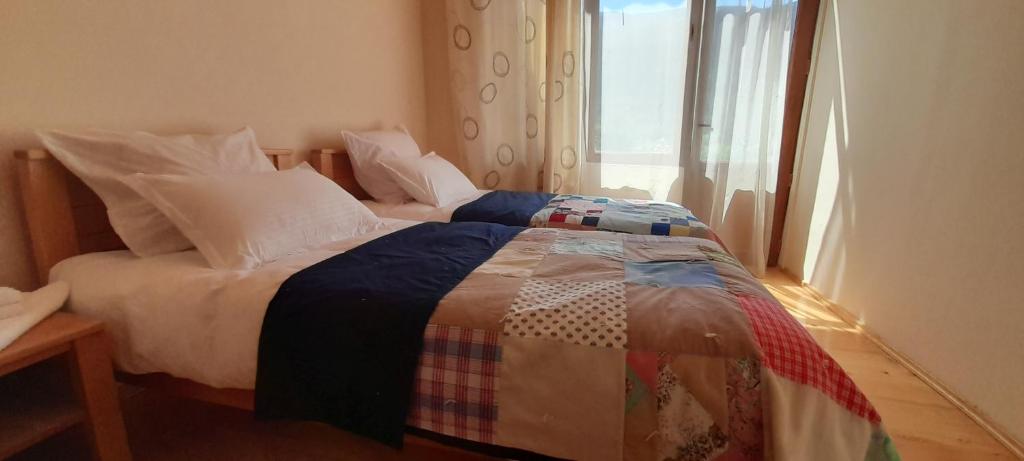Llit o llits en una habitació de Guest house Lekhtagi