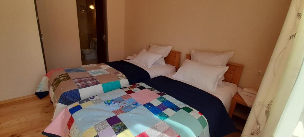 Llit o llits en una habitació de Guest house Lekhtagi