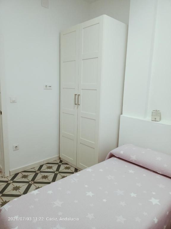 Postel nebo postele na pokoji v ubytování Apartamento Ara